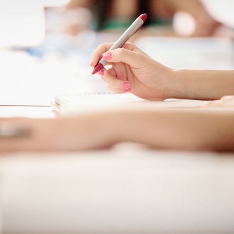 Image of students writing