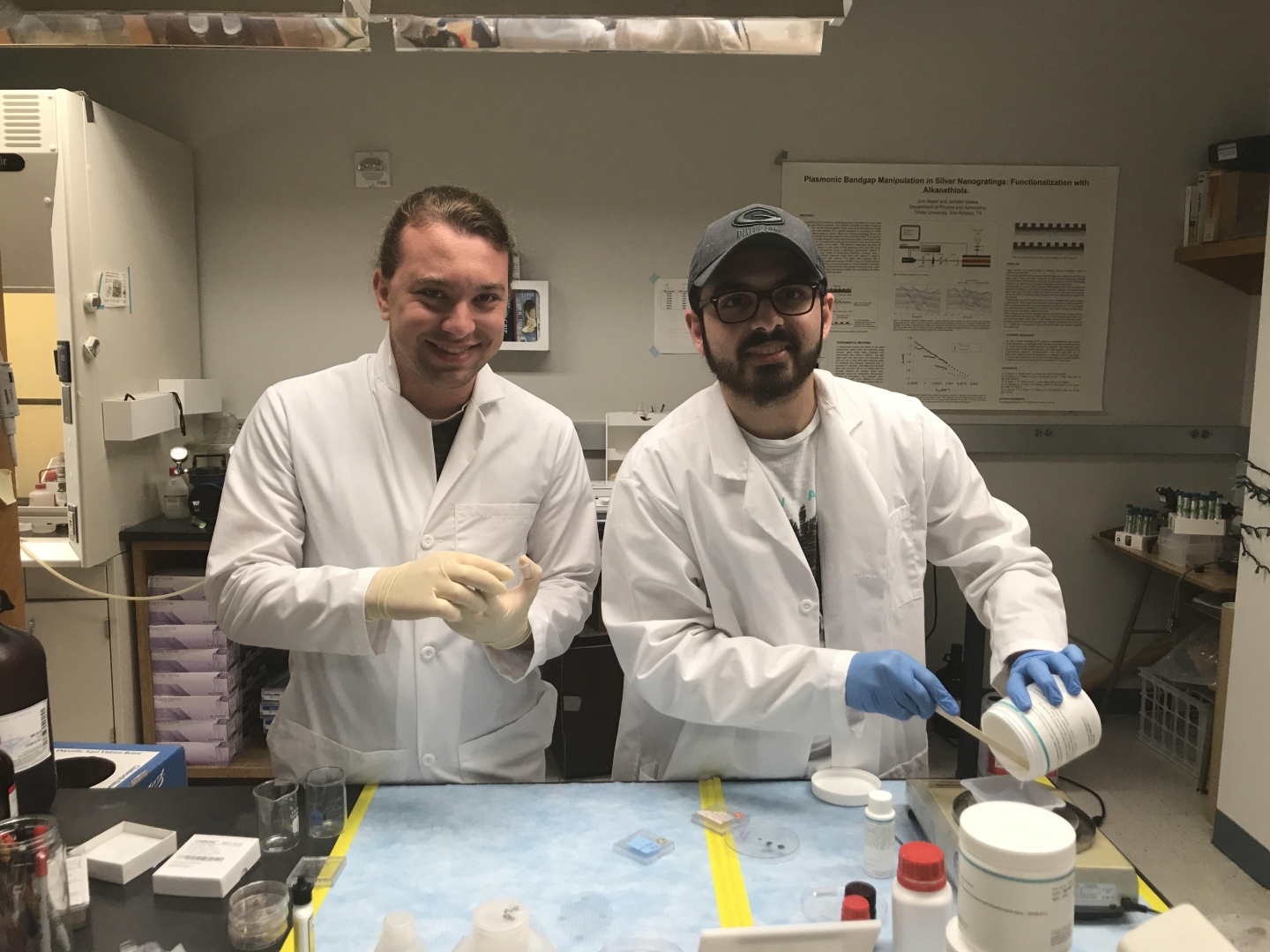 Two students working with lab specimens