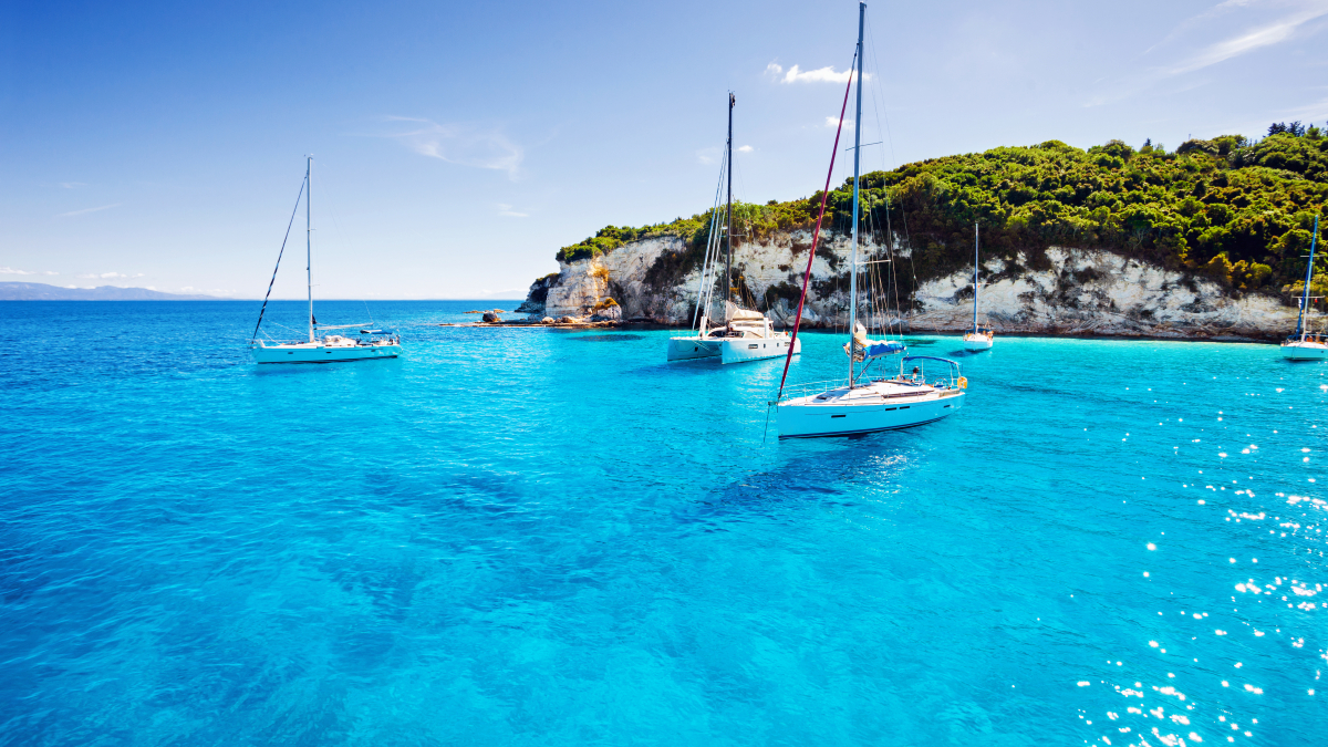 Boats on a lagoon off an island