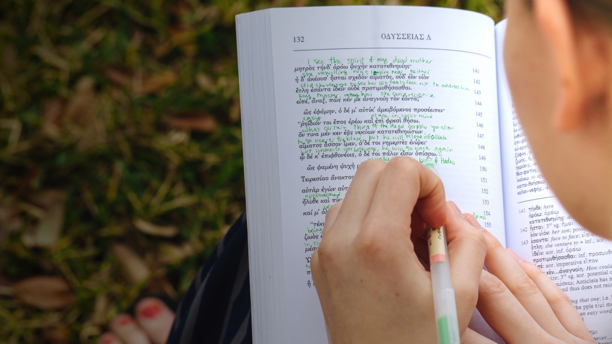 Student studies books with foreign language.