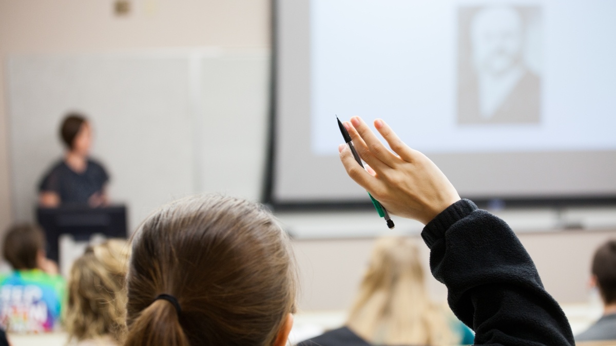 Hand raised in classroom