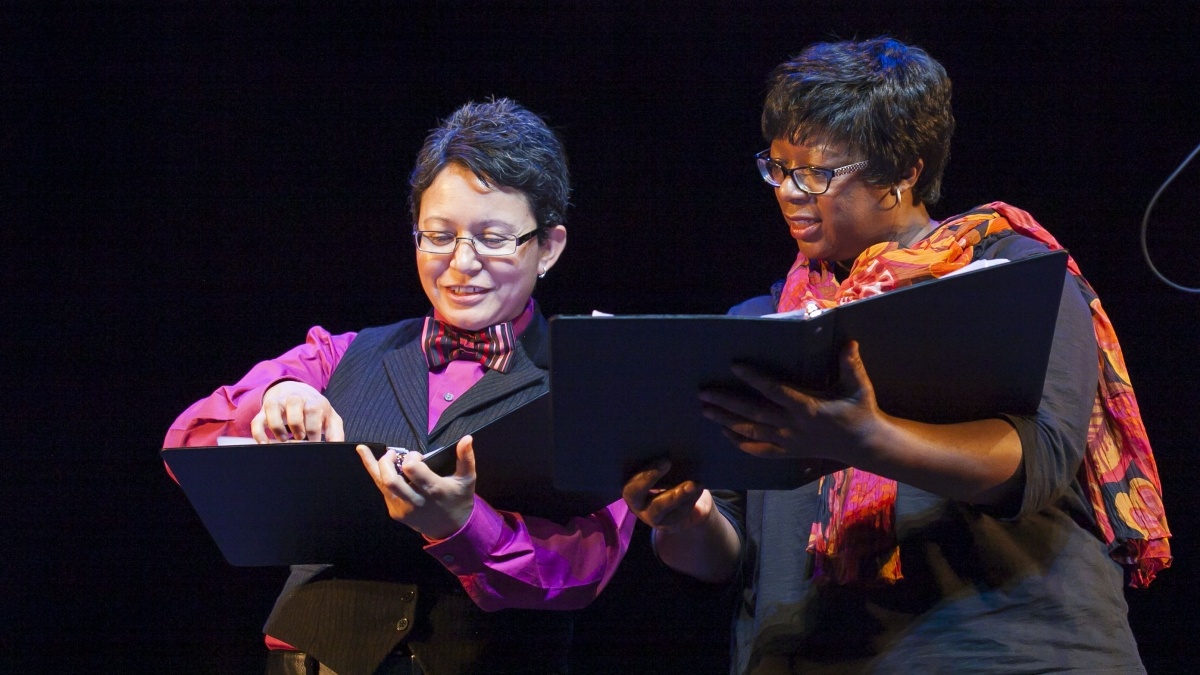 faculty with notebooks