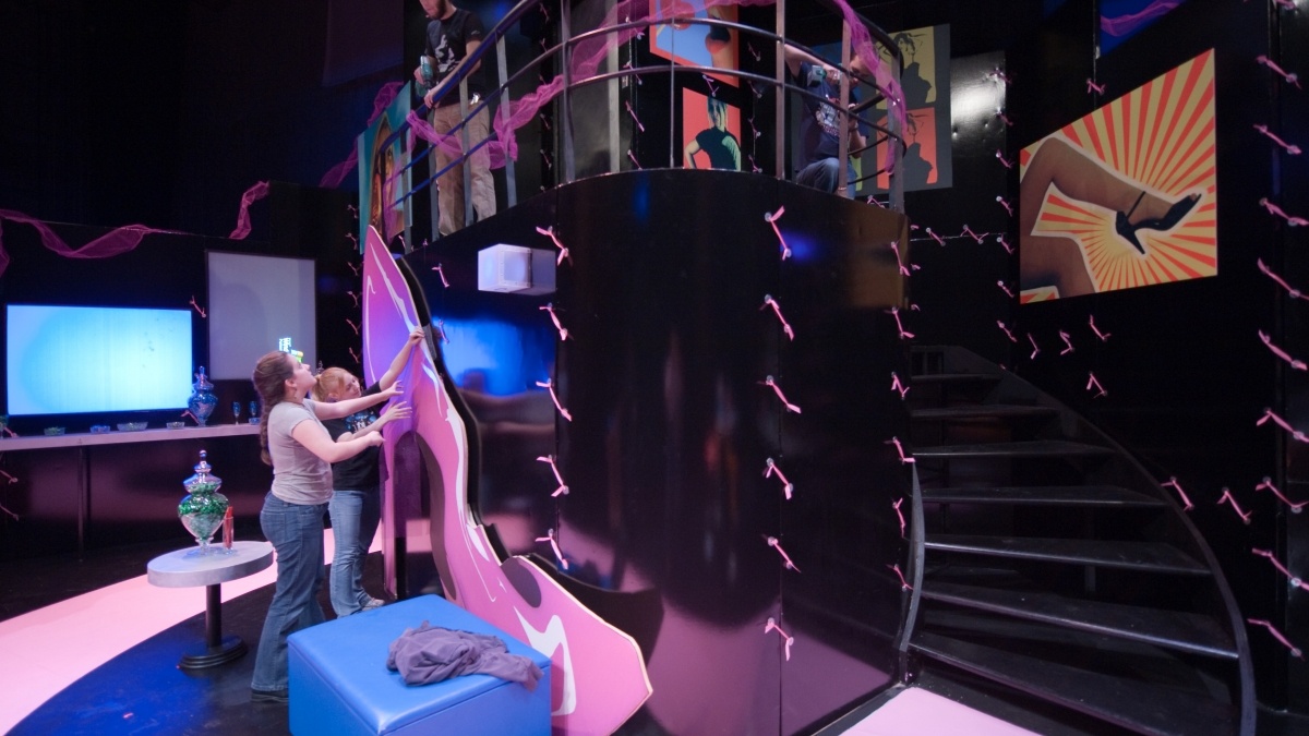 Students decorating the stage.