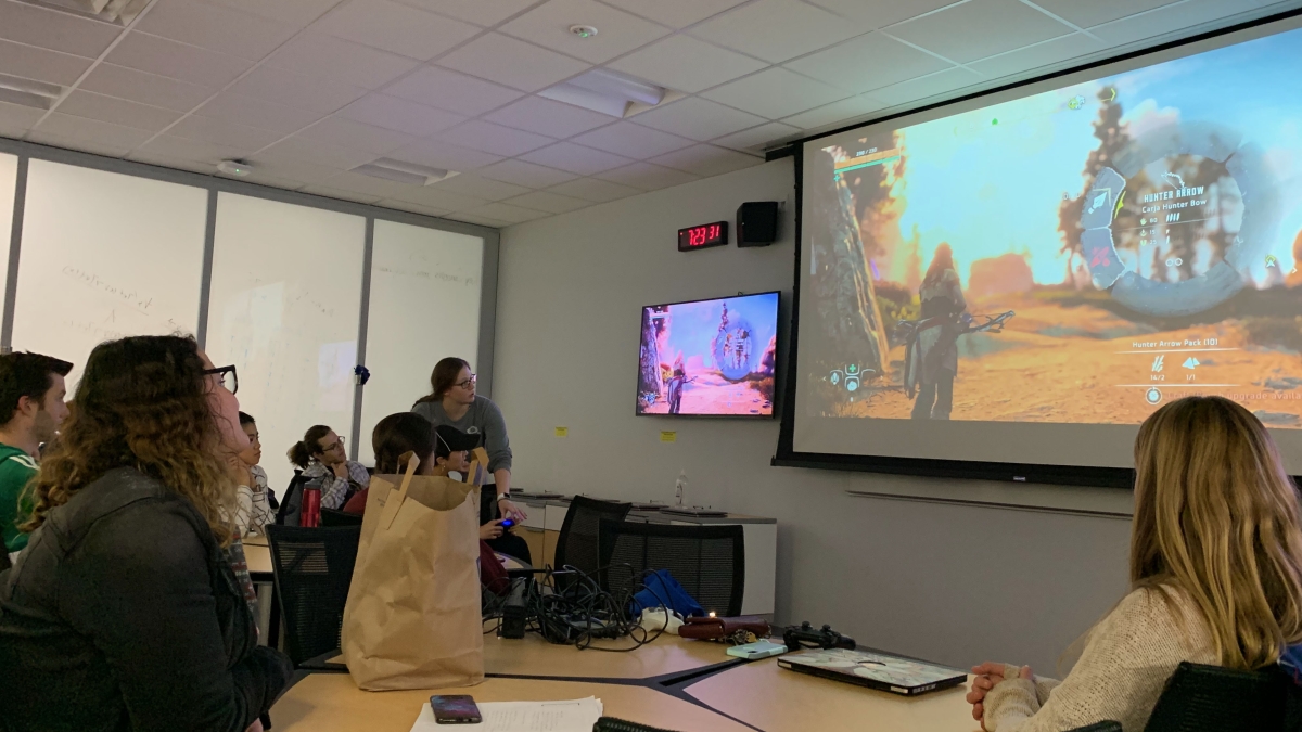 Students evaluate a video game in class