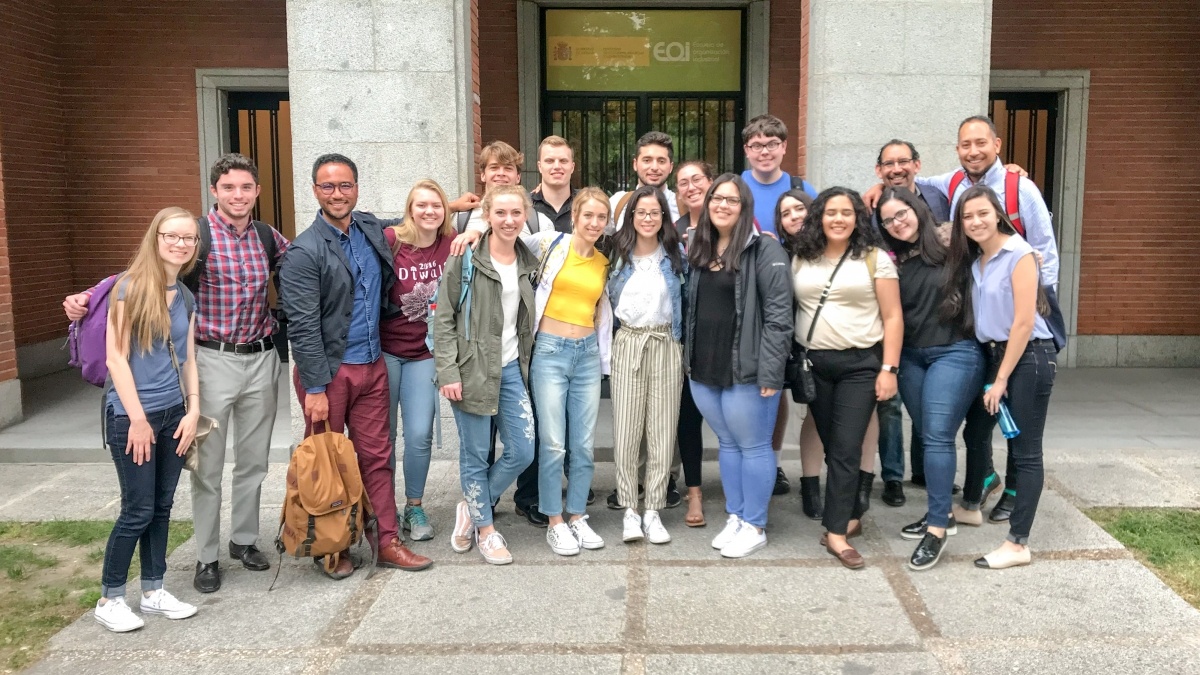 Group of students in Madrid in front of a building